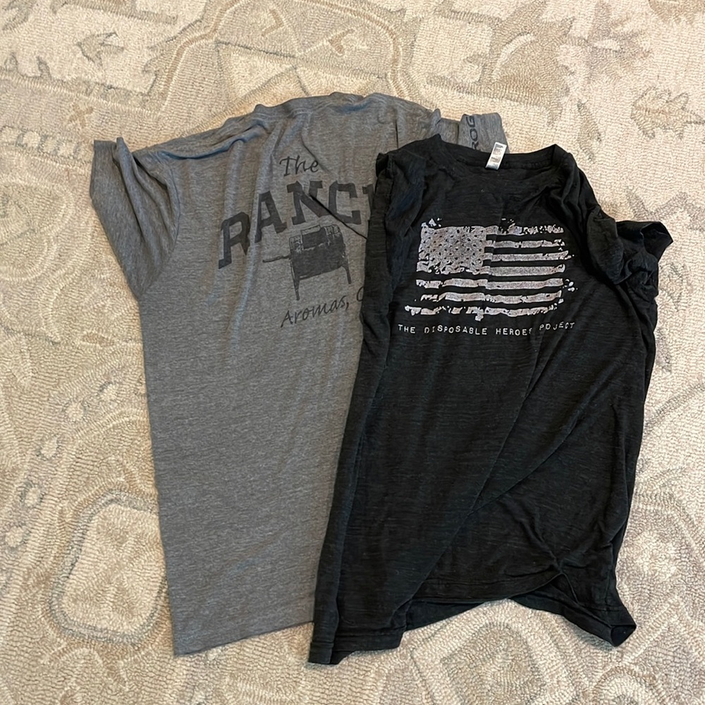 Set of 2 t-shirts. Black and grey colors. Both are cotton and polyester.